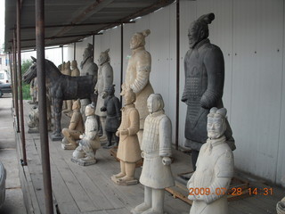 China eclipse - Beijing tour - cloisonne shop with their own terra-cotta warriors