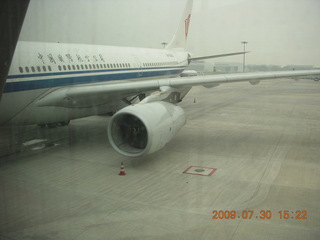 China eclipse - Beijing airport - airplane flying to YVR