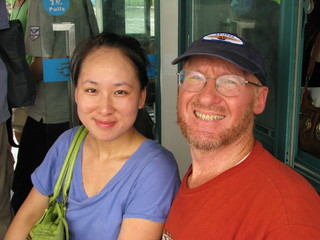 15 6xy. China eclipse - Mango's pictures - Mango and Adam on West Lake boat ride