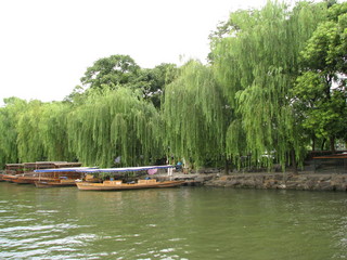 China eclipse - Mango's pictures - Adam on West Lake boat ride