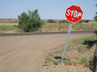 30 6z7. Saint Johns Airport (SJN) run - mutilated STOP sign