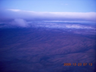 aerial - pre-dawn clouds and mountains