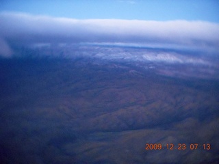 4 72p. aerial - pre-dawn clouds and mountains