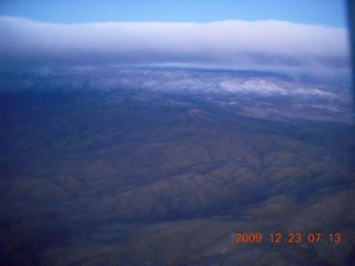 aerial - pre-dawn clouds and mountains