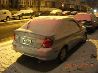snow covered car back in Philly