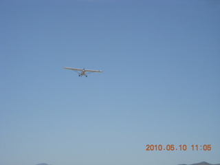 113 77a. Alamo Lake airstrip - landing airplane