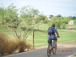 Adam riding bicycle on Green Belt in Scottsdale