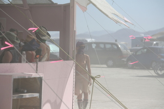 7S5 to DVT trip - Nevada - Black Rock City - Burning Man entrance - woman with face protected