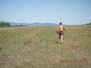 43 7c2. Adam running at Me-Own airstrip (with SPOT on the belt strap) - back