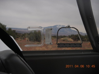 460 7j6. Nokai Dome airstrip - Navajo Mountain through N8377W window