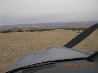 461 7j6. Eagle City airstrip through windshield of N8377W