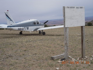 463 7j6. Eagle City airstrip and N8377W and sign