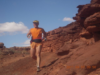 19 7j7. Canyonlands Lathrop hike/run - Adam running (tripod)