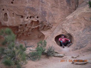 1456 7j9. Arches Devil's Garden hike - Adam in hole in rock