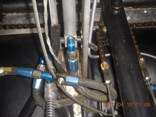 471 7ja. N8377W under instrument panel - cylinder temp gauge and controls chain tangle
