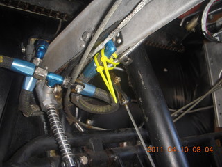 475 7ja. N8377W under instrument panel - cylinder temp gauge and controls chain tangle