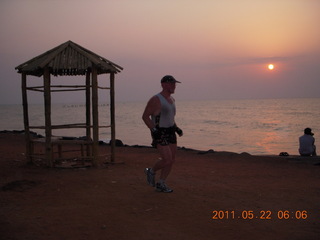 1546 7kn. India - Puducherry (Pondicherry) run - Bay of Bengal beach - Adam running -  soft sunrise