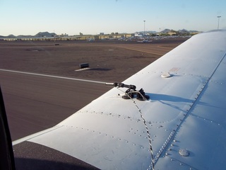 560 7ls. movie camera on N8377W wing