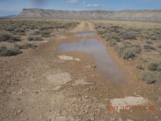 657 7qa. Sand Wash airstrip run - muddy dirt road - N8377W in the distance