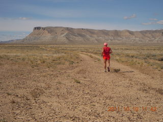 81 7qa. Sand Wash airstrip - Adam running - back (tripod)