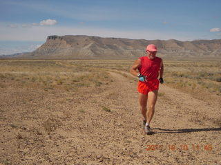 77 7qa. Sand Wash airstrip - Adam running (tripod)
