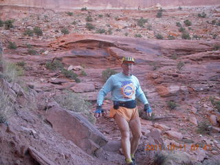 1678 7qb. Canyonlands National Park - Lathrop trail hike - Adam hiking (tripod)