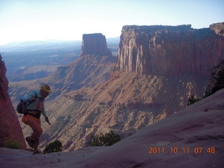 1682 7qb. Canyonlands National Park - Lathrop trail hike - Adam hiking (tripod)