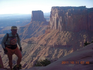 1683 7qb. Canyonlands National Park - Lathrop trail hike - Adam hiking (tripod)
