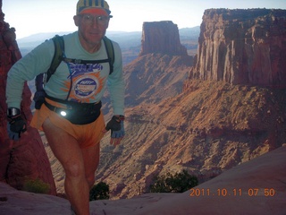 1685 7qb. Canyonlands National Park - Lathrop trail hike - Adam hiking (tripod)