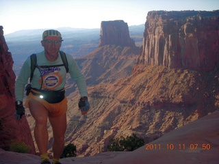 1686 7qb. Canyonlands National Park - Lathrop trail hike - Adam hiking (tripod)