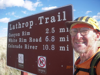 1704 7qb. Canyonlands National Park - Lathrop trail hike - Adam and sign