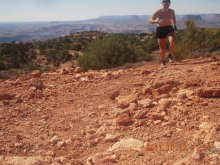 89 7qc. Canyonlands National Park - Murphy run - Adam running (tripod)