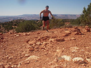 90 7qc. Canyonlands National Park - Murphy run - Adam running (tripod)