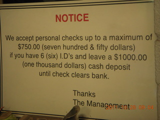 Doug's Buggs check-cashing sign $1000 deposit and six IDs