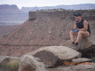 1821 7x1. Canyonlands Murphy hike - Adam at vista view (tripod)