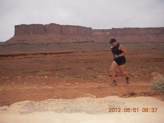 102 7x1. Canyonlands Murphy hike - Adam running (tripod)
