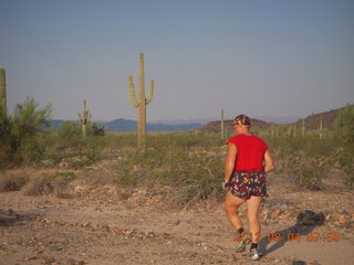 95 804. Adam running at Windmill airstrip (tripod, back)