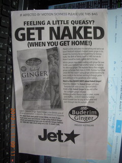 55 83b. 'Get Naked' on vomit bag