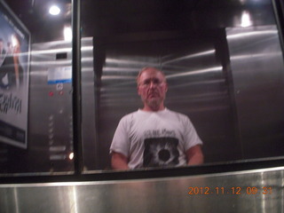 82 83c. Adam in hotel elevator
