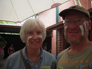 150 83d. Tjapukai Aboriginal Cultural Park - tourist and Adam with painted faces