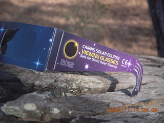 86 83e. total solar eclipse - half a pair of eclipse glasses (for cyclops?)