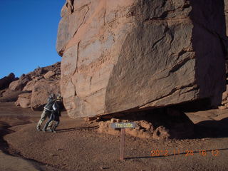 Monument Valley tour - Sean and Kristina holding up cube rock