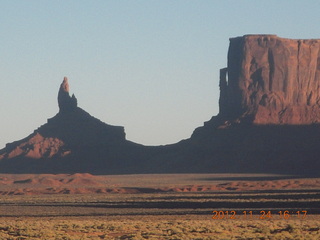 Monument Valley tour - Sean and Kristina holding up cube rock