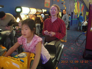 464 849. Cecelia playing video game and Betsy