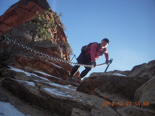 1923 84p. Zion National Park - Angels Landing hike - Adam using chains