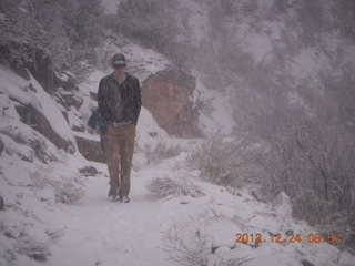 57 84q. Zion National Park - cloudy, foggy Observation Point hike - another hiker