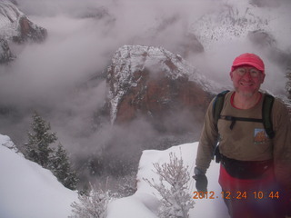 1955 84q. Zion National Park - cloudy, foggy Observation Point hike - Adam at the top