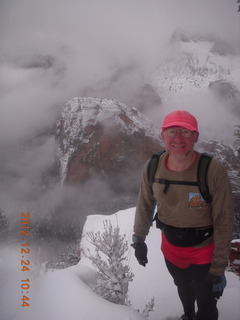 1956 84q. Zion National Park - cloudy, foggy Observation Point hike - Adam at the top