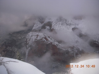 133 84q. Zion National Park - cloudy, foggy Observation Point hike - view of Angels Landing from the top