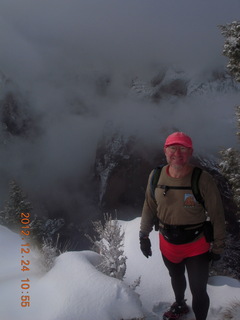 1958 84q. Zion National Park - cloudy, foggy Observation Point hike - view from the top - Adam at the top